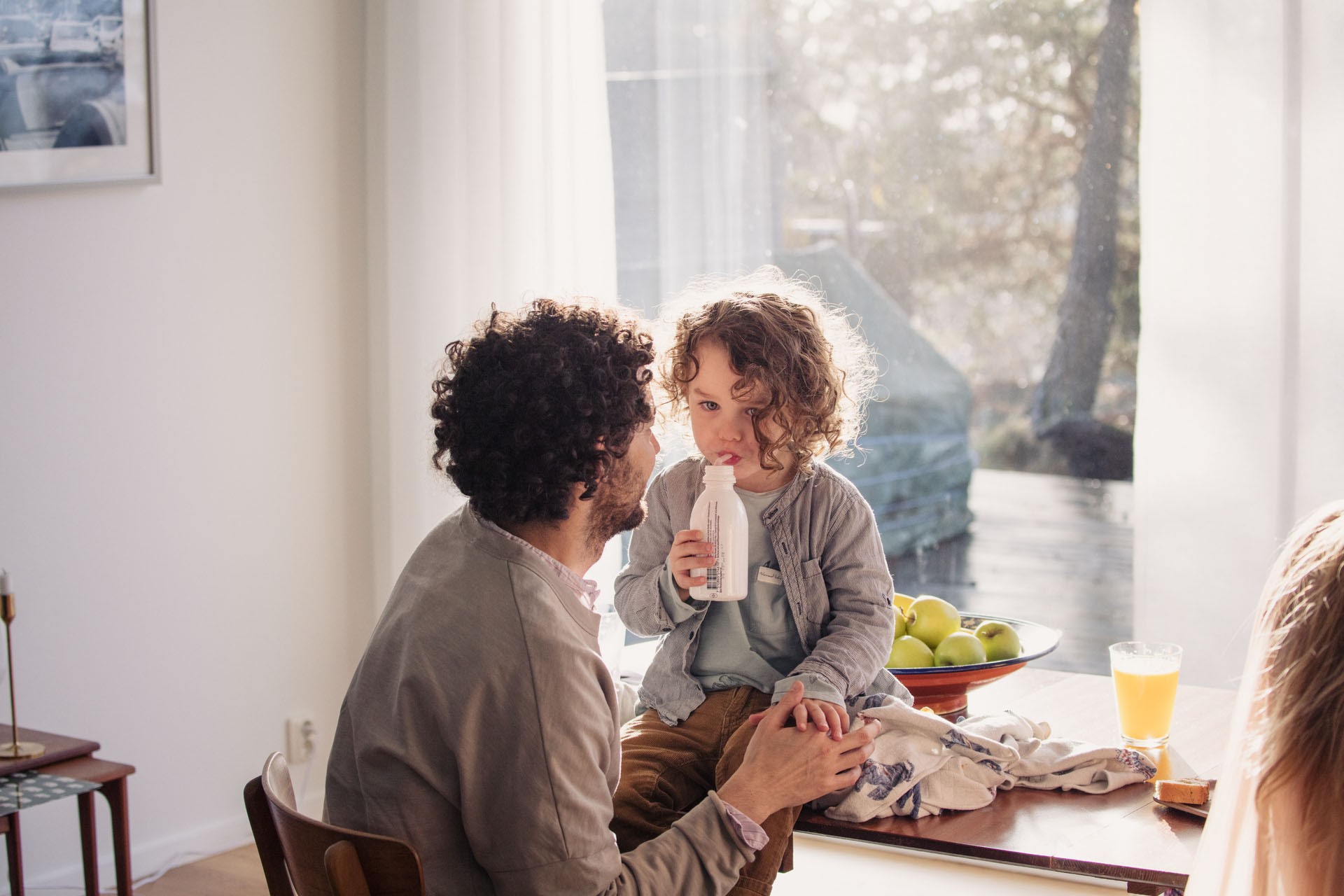 Man en kindje aan tafel l Vattenfall energie