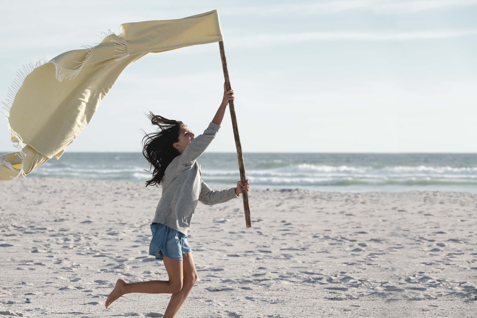 Meisje met vlag op het strand | Mijn Vattenfall
