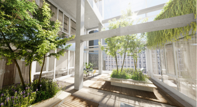 Een licht wit pand met veel planten en bomen